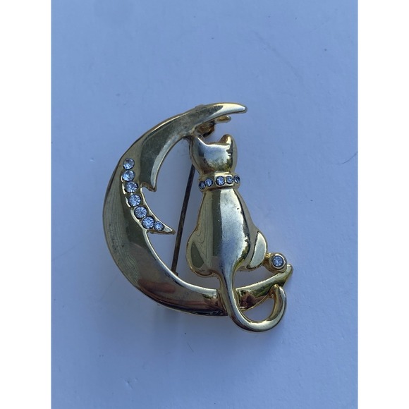 Crescent Jewelry - VTG Gold-Tone Cat sitting on Crescent Moon Brooch Pin with Rhinestone Accents